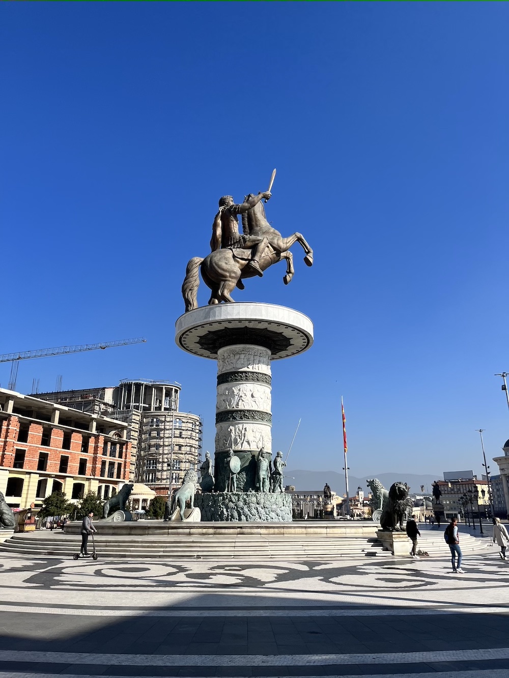 The Statue of Alexander the Great (called "Warrior on a Horse") in the main Macedonia square with blue skies. 